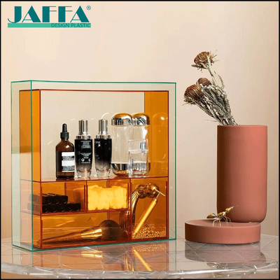 Bon prix Organisateur de bureau personnalisé en acrylique JAFFA pour parfums, boîte de rangement superposée de maquillage et de soins de la peau de couleur ambre, support transparent de luxe en ligne